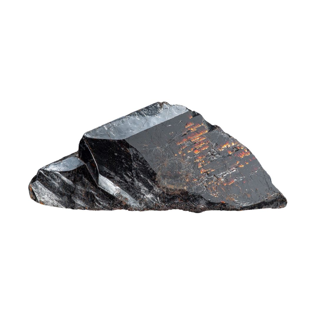 Titanite, a black shiny wedge shaped mineral.