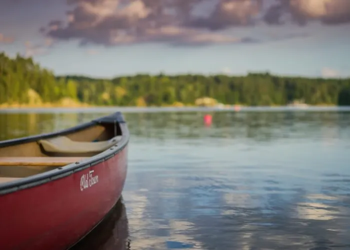 A canoe floating on a lake