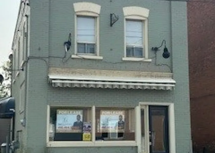 Facade of a vacant storefront in downtown Tweed