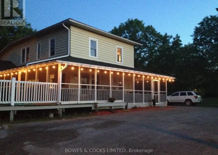 View of the outside of the Coe Hill Hideaway Restaurant in Coe Hill in the evening