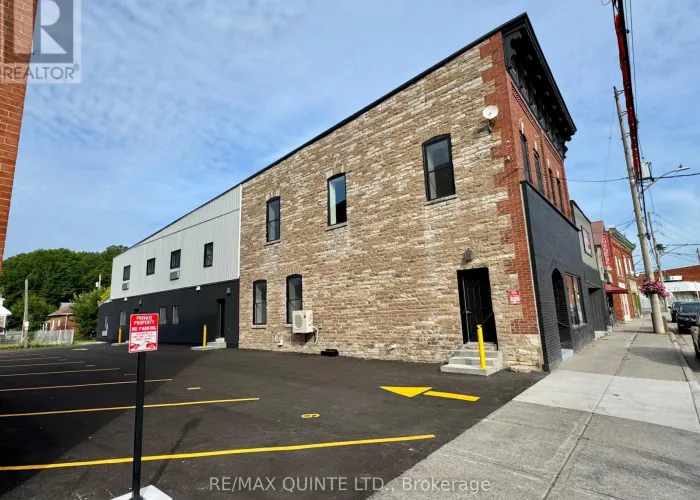 Exterior view of a building in downtown Tweed available for rent