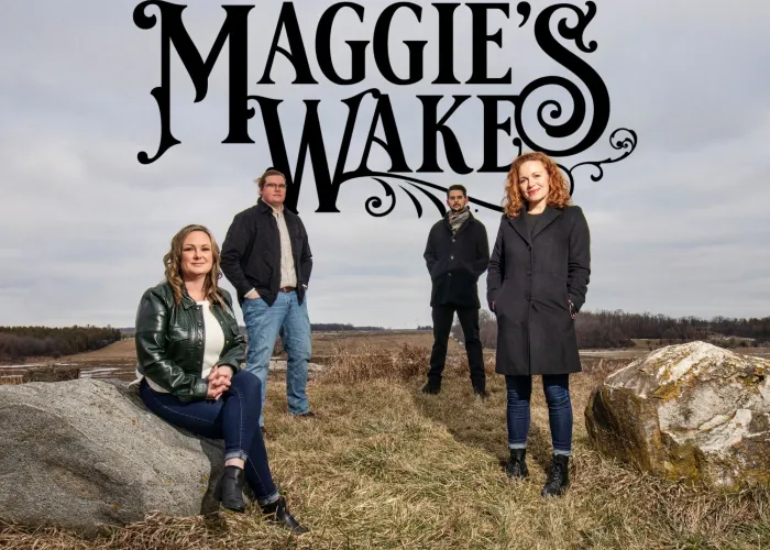 Maggie's Wake band members posing outside